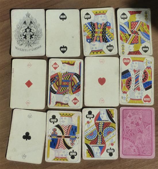 A c.1880s pack of standard playing cards by WOOLLEY & Co. 51 cards. Missing 4 of Spades. Condition: well used and some staining.